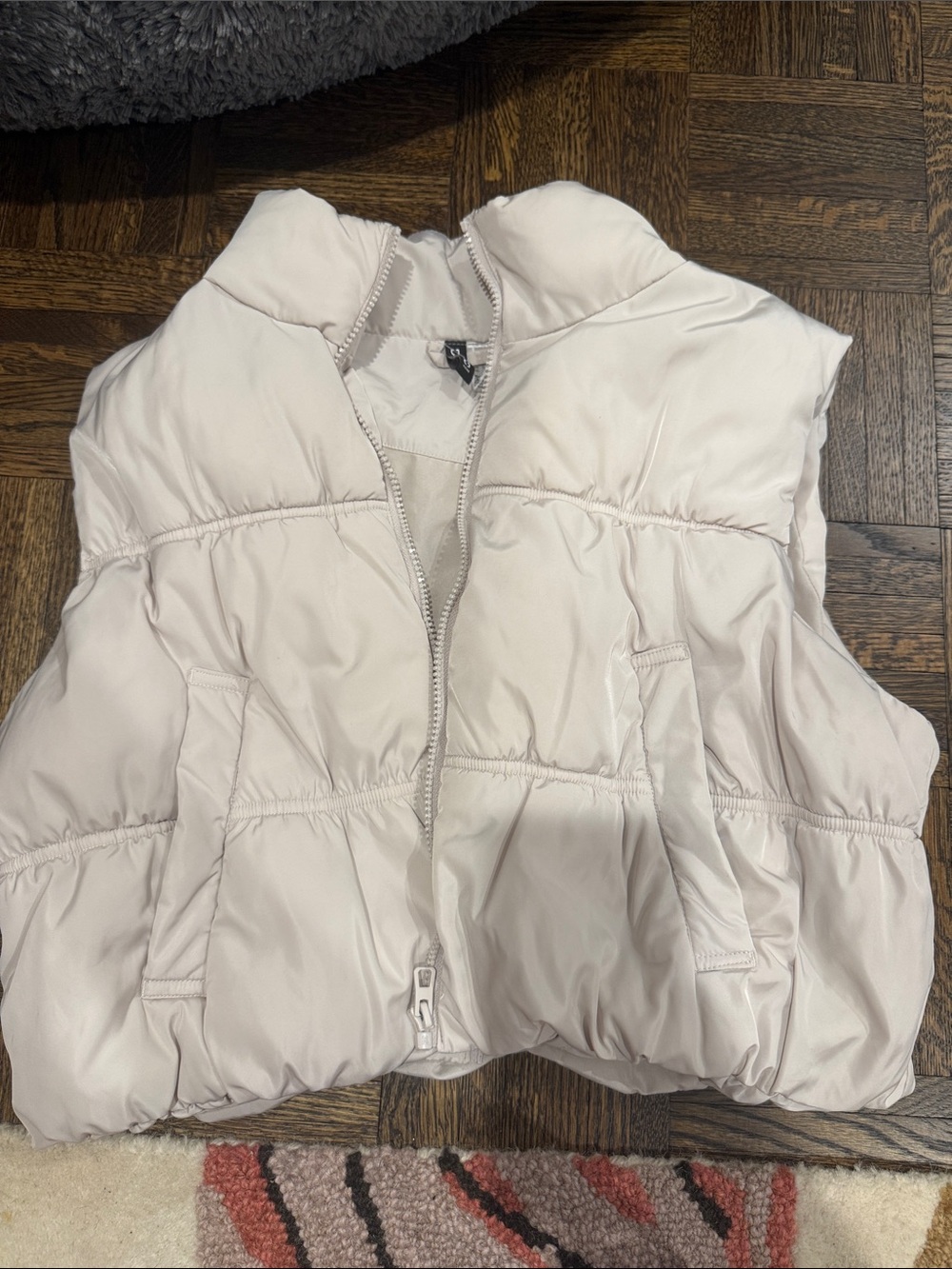 Divided Light Cream Puffer Vest